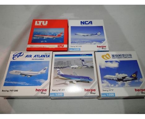 Five Herpa 1/500 scale airliners, various types and liveries, mostly excellent condition and boxed. UK P&amp;P Group 1 (£16+V