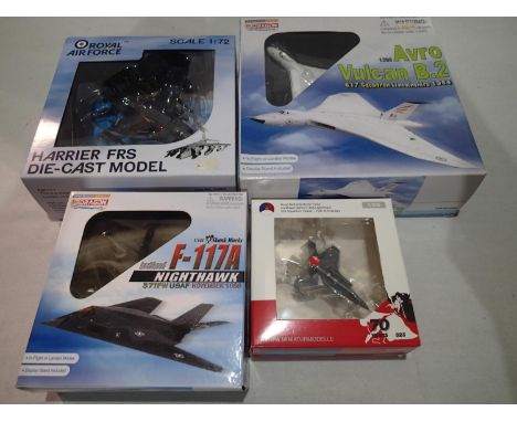 Four diecast aircrafts, 1/200 scale Vulcan and Lightening, 1/144 scale Nighthawk, and 1/72 scale Harrier, all appear in excel