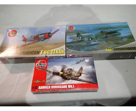 Three 1/72 scale Airfix aircraft kits, Hurricane, Texan and Strikemaster, as new, sealed, wear to boxes. UK P&amp;P Group 1 (