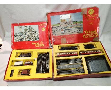 Two OO scale Triang train sets- R54 Jinty with three wagons and track, R1 Princess Elizabeth with two coaches, track and tran