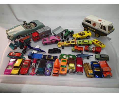 Approximately thirty play worn diecast vehicles, mostly Matchbox, plus tinplate Friction Drive sports car and Triang ambulanc