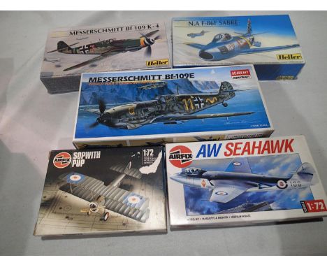 Five 1/72 scale aircraft kits, Academy ME 109E, Heller sabre and ME 109K4, Airfix Sopwith Pup and Seahawk, all appear complet