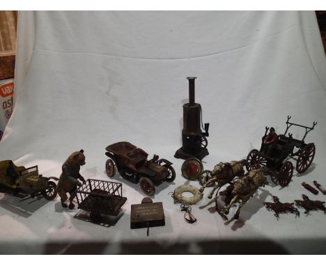 Pull along cast iron horses and cart with steam engine, clockwork bear and cart, two clockwork cars (red one L: 20 cm), all f