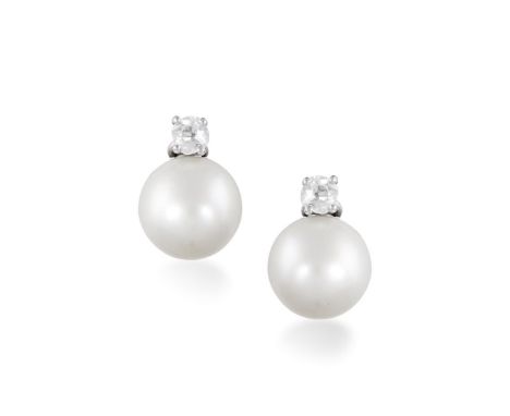A PAIR OF CULTURED PEARL AND DIAMOND EARRINGSEach round-shaped cultured pearl of cream tint, accented by a round brilliant-cu