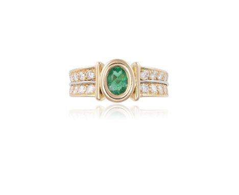 AN EMERALD AND DIAMOND RING, BY FREDThe collet-set oval-shaped emerald, within a double-row of brilliant-cut diamond shoulder