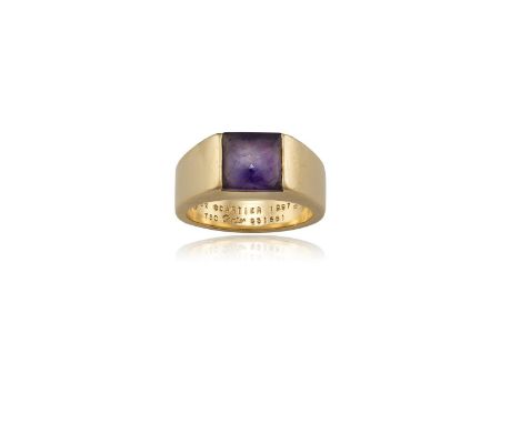 AN AMETHYST 'TANK' RING, BY CARTIER, 1997The square cabochon amethyst with faceted pavilion, to a polished gold hoop, mounted