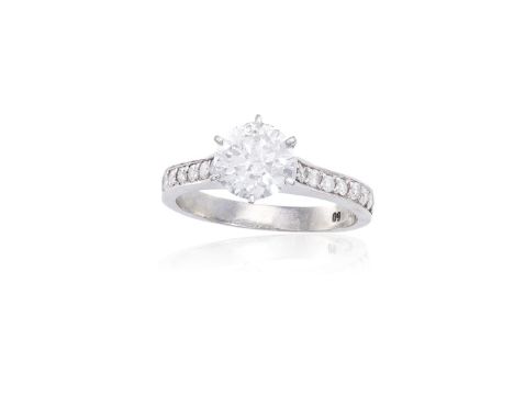 A DIAMOND SINGLE-STONE RINGThe round brilliant-cut diamond, within a six-claw setting, weighing approximately 1.20cts, to rou