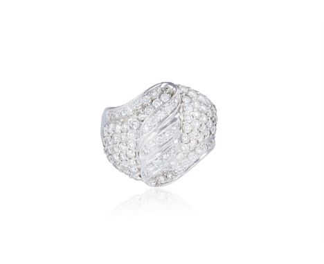 A DIAMOND DRESS RINGThe bombé ring set throughout with round brilliant-cut diamonds, mounted in gold, diamonds approximately 