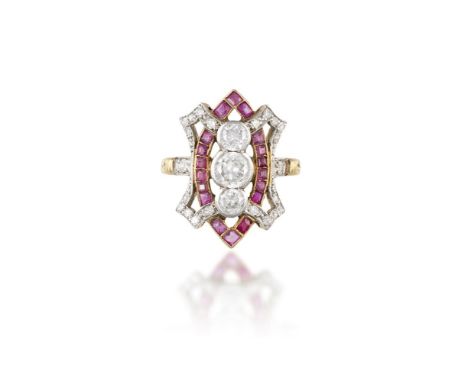 AN EARLY 20TH CENTURY DIAMOND AND RUBY RINGThe collet-set central trio of old brilliant-cut diamond, within a marquise frame 