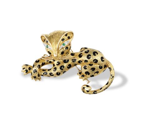 A GEM-SET NOVELTY BROOCH, BY FREDThe stylised leopard, textured to represent fur, with black enamel spots on the body, emeral