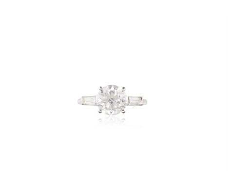 A DIAMOND SINGLE-STONE RINGThe round brilliant-cut diamond, weighing approximately 2.20cts, within a four-claw setting to bag