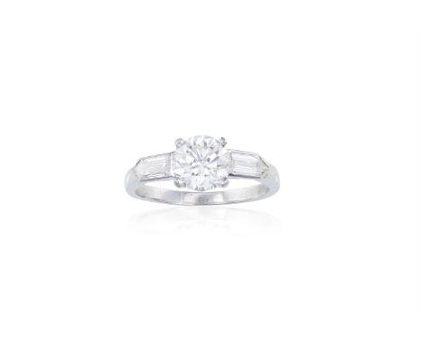 A DIAMOND SINGLE-STONE RINGThe round brilliant-cut diamond weighing 1.50cts, within a four-claw setting, between bullet-shape