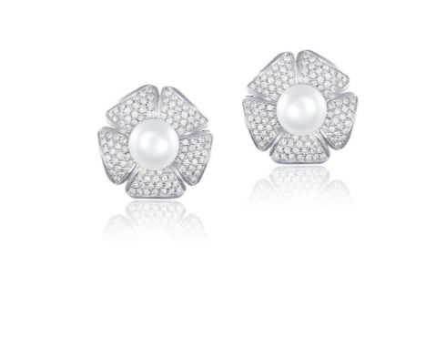 A PAIR OF CULTURED PEARL AND DIAMOND EARRINGSEach designed as a flowerhead, the central button-shaped cultured pearl of white