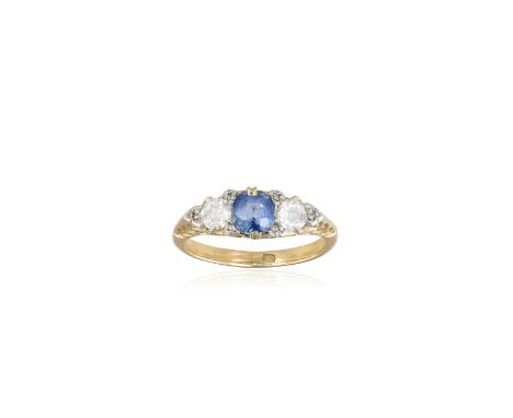 A LATE VICTORIAN SAPPHIRE AND DIAMOND RINGSet with a cushion-shaped sapphire, between two old brilliant-cut diamond shoulders