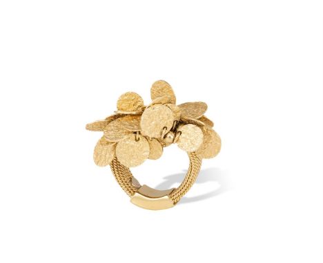 A GOLD DRESS RING, BY CATHERINE PREVOSTThe cluster of gold textured discs, interspersed by gold beads, to a rope twist hoop, 