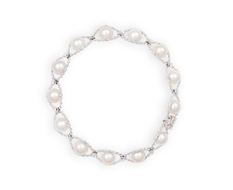 A CULTURED PEARL AND DIAMOND BRACELETThe bracelet designed as a row of round cultured pearls, each with a ropetwist surround 