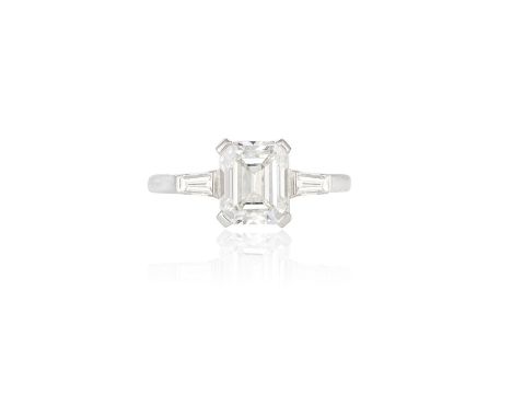 A DIAMOND SINGLE-STONE RINGThe rectangular-cut diamond weighing approximately 1.90cts, within a four-claw setting, between tw