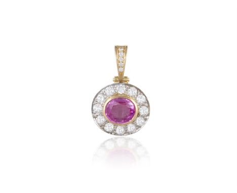 A PINK SAPPHIRE AND DIAMOND PENDANTThe collet-set oval-shaped pink sapphire weighing approximately 3.20cts, within a surround