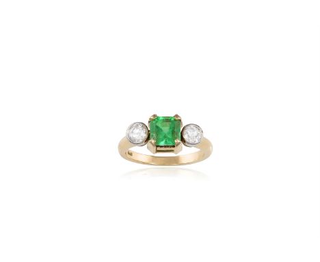 AN EMERALD AND DIAMOND RINGThe square-cut emerald within a four-claw setting, between two round brilliant-cut diamonds, mount