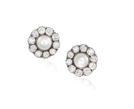 A PAIR OF PEARL AND DIAMOND CLUSTER EARRINGSEach round-shaped pearl of cream tint, within a frame of old brilliant and cushio