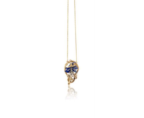 A 19TH CENTURY DIAMOND AND ENAMEL PENDANT/BROOCHThe stylised openwork scroll and foliate flower design, highlighted by old br