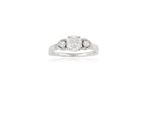 A DIAMOND SINGLE-STONE RINGThe round brilliant-cut diamond, weighing approximately 1.30cts, between two pear-shaped diamond s