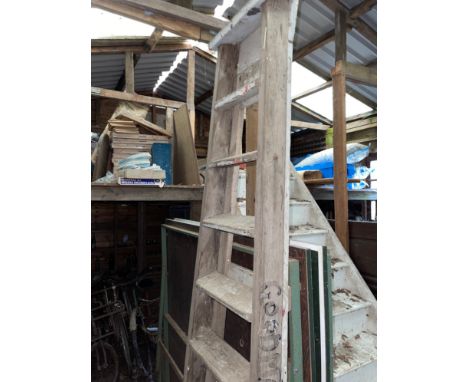 A large vintage wooden step ladder, H. 250cm.