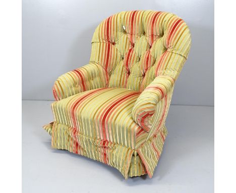 A Victorian mahogany and upholstered button back nursing chair, with fluted legs. 