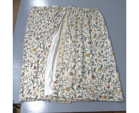 Two pairs of Crewelwork design curtains. The first drop 178cm and hemmed width 126cm, and the other drop 170cm, hemmed width 