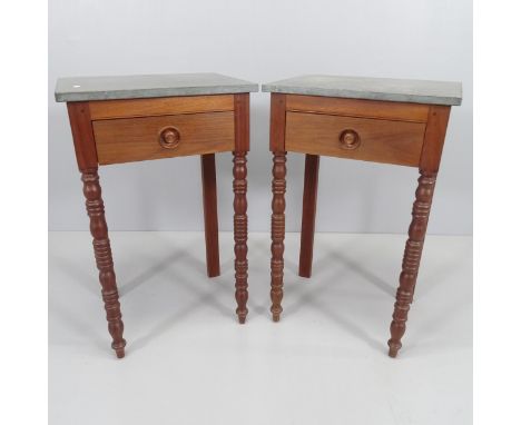 A pair of modern teak side/lamp tables, with slate top and single frieze drawer. 46x75x36cm. 