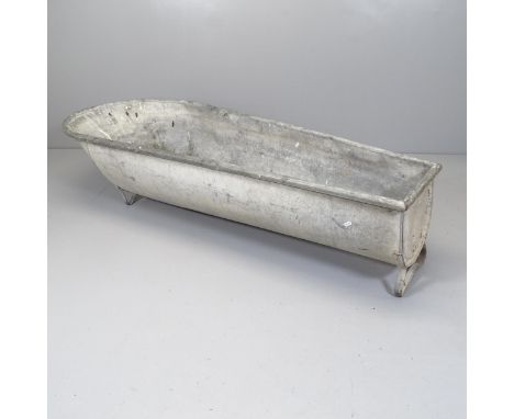 A galvanised metal trough. 173x28x67cm 