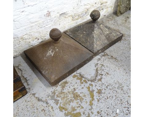 A pair of square-based cast iron gate-post caps. 49x38cm. 