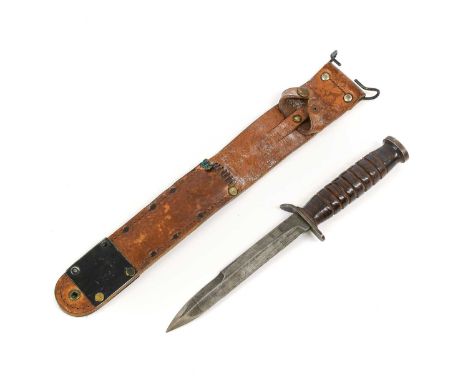 A U.S. M3 - Utica Fighting Knife, the 16.5cm draw-back steel blade stamped with maker's mark, with steel crossguard and stack