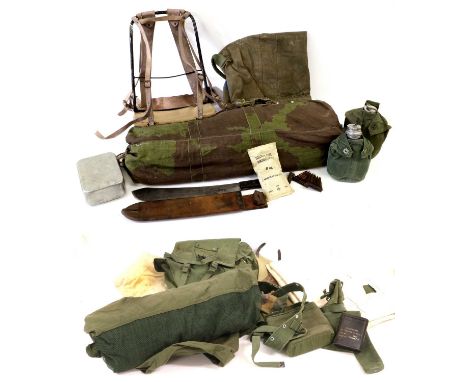 A Quantity of Militaria, including a lightweight camouflage ridge tent with black-out lining, a vintage backpack frame in bla