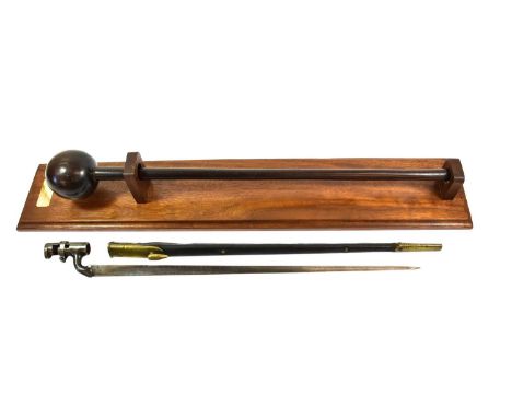 A 19th Century Zulu Knobkerrie, of lignum vitae, with large globular head and cylindrical haft bearing marks of original wove