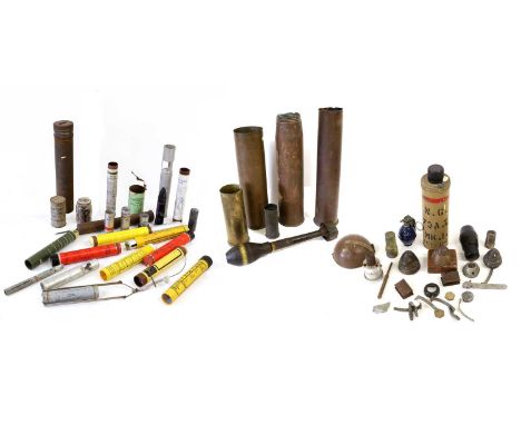 A Quantity of Militaria, including various modern inert flare rockets, a mortar shell, five brass shell cases, pieces of shra