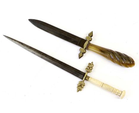 A Midshipman's Dirk, the 22.5cm double edge steel blade with a raised medial ridge to each side, the brass crossguard with ac