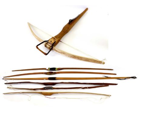 A Scratch Built Yew Wood Crossbow, with 97cm laminated limb, the square section stock with metal trigger and cocking stirrup;