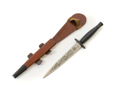 Operation Desert Storm - A Fairbairn Sykes Commemorative Fighting Knife, Third Pattern, one side of the 17cm steel blade etch