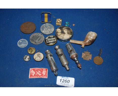 Miscellaneous commemorative Medals, a clay pipe, old whistles and a souvenir Medal from the Eiffel Tower, 1889.