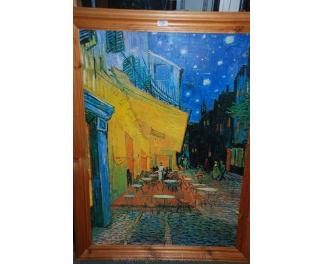 A large framed Print of an Impressionist night time French street scene with a cafe under a starry sky being a reproduction o