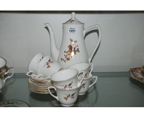 A Royal Worcester porcelain Coffee set decorated with brown and gilt fruit on a white ground, good condition.