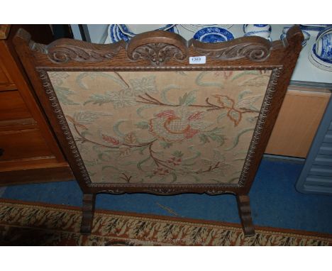 An Oak framed Fire screen with tapestry panel