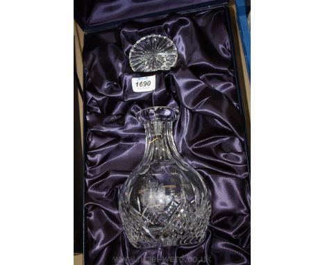 A boxed cut glass Decanter with a modern cypher. 