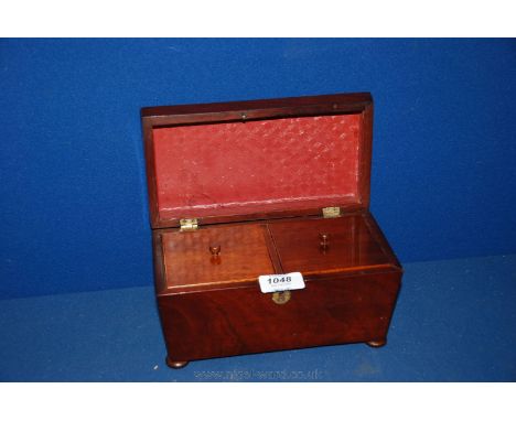 A Victorian Mahogany Tea Caddy.