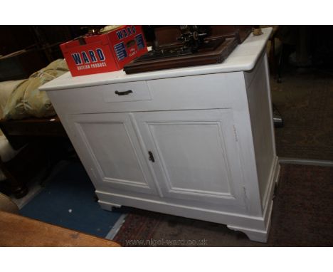 A circa 1920 white painted French pine ''Shabby Chic'' Dresser Base/Kitchen Cabinet having rectangular top over central small