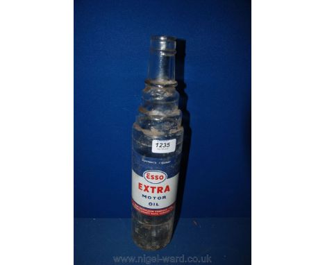 A glass, one quart Esso lubricant Bottle.