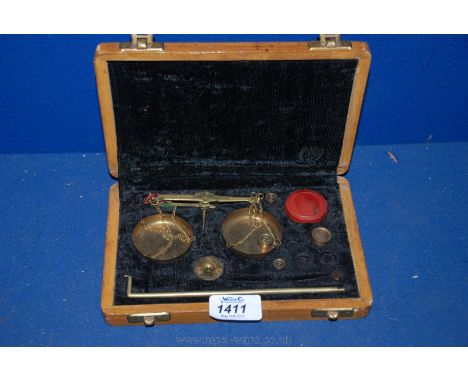 A set of portable Scales and weights, boxed