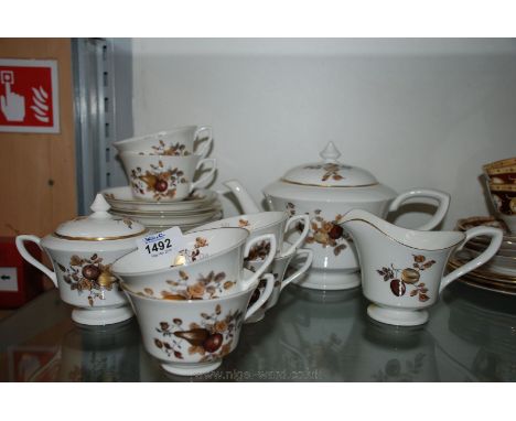 A Royal Worcester Tea Service decorated with brown and gilt fruit on a white ground, good condition.