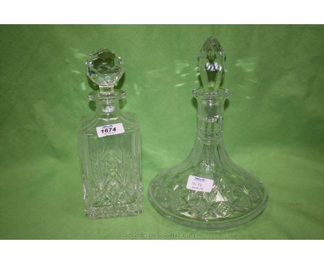 A cut glass square Decanter and stopper and a heavy ship's Decanter and stopper